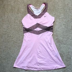 Nike tennis dress in pink with mesh details and a built-in bra in size medium